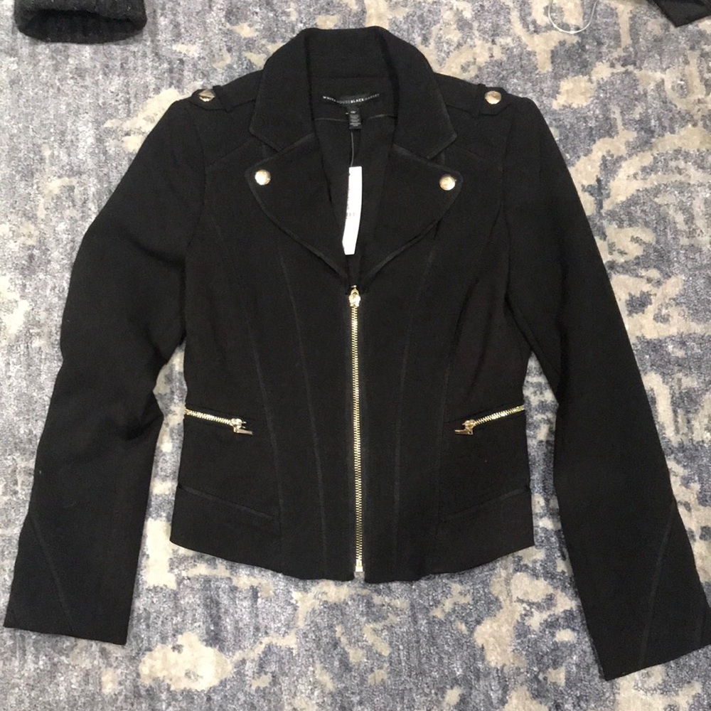 Black blazer with silver zipper and bottons
